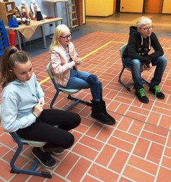 Foto von Teilnehmern in der Aula